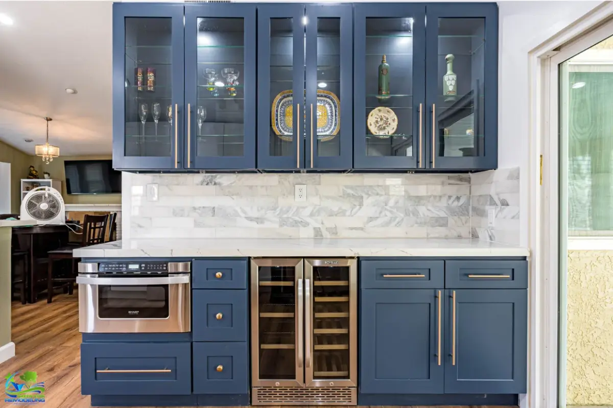 Full kitchen remodel in Santa Clarita with white cabinets and navy accent by Green Star Remodeling