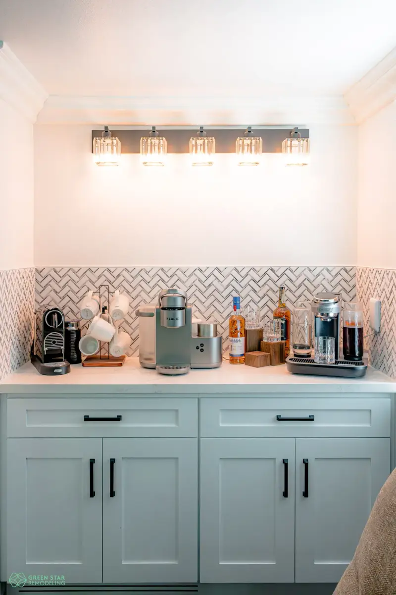 Built-in coffee bar with a herringbone tile backsplash in a Santa Clarita kitchen remodel.